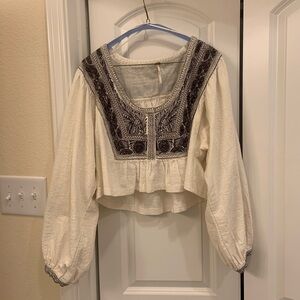 Free People cropped Iggie Embroided Blouse. Size S. Never been worn.